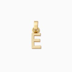 Personalize a charm bracelet, charm necklace, or charm huggie earrings with our Letter Charm. Coming in every letter, this gold charm is perfect for adding initials or a special message to your look. Want a letter charm that has a little more sparkle? Get our pavé version to really stand out. Need more charms or charm bases for your collection? Build Your Own Charm Jewelry now and get all the charm necklace inspo you need right here. Initial T, Uncommon James, Initial M, Gold Letter, Letter Charm, Bracelet Charm, Letter Charms, Huggie Earrings, Gold Letters