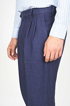 Treat yourself to a more refined take on relaxation with these pure linen pants, featuring a straight and relaxed fit, and a mid-waisted cut. Formal Blue Linen Bottoms, Tailored Linen Casual Pants, Tailored Casual Linen Pants, Formal Linen Bottoms For Summer, Formal Linen Summer Bottoms, Elegant Blue Linen Pants, Formal Linen Pants With Straight Hem, Tailored Linen Wide-leg Bottoms, Tailored Linen Wide Leg Bottoms