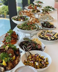 a long table filled with lots of different types of food