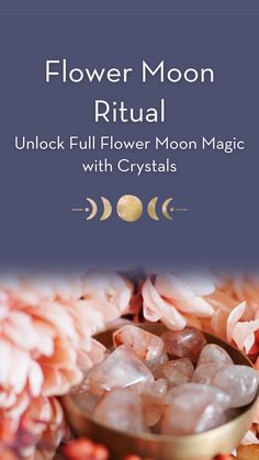 the flower moon ritual with crystals is shown in front of pink flowers and blue sky