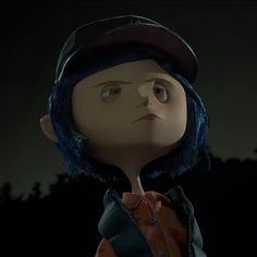 a doll with blue hair wearing a hat and orange shirt is staring at the sky