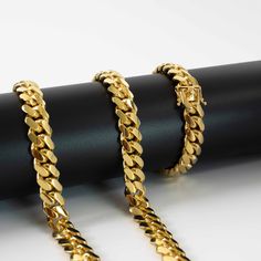 Comfortable, lightweight, and amazingly versatile. This Silver Cuban Link Chain is a must-have for anyone who wants to elevate everyday casual or formal outfits with a nice simple necklace for men.Approximate weight: 150-220 grams 💎 Precious Metal Gold Bonded: Premium quality 925 silver material covered in thick 14K yellow gold to add a taste of luxury in all of your outfits. ⚒️ Craftmanship Crafted to Perfection: Get nothing but the best. This wonderful piece is crafted using top-quality mater Gold Cuban Link Chain, Mens Silver Necklace, Gold Bond, Silver Coat, Solid Gold Jewelry, Cuban Link Chain, Men's Necklace, Mens Gold, Cuban Link