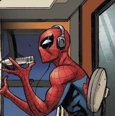 a spider - man with headphones on, holding a microphone and looking at the mirror