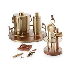 an assortment of brass items on a white background