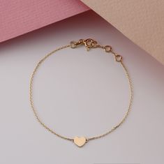 Mini Gold Heart Bracelet / Dainty 14k Gold Bracelet / Minimalist Heart Bracelet / Dainty Gold Heart / Absolutely the cutest out there / LOVE The dimension of Heart: 5.5x7.5mm Available 14K White, Yellow, Rose Gold ( SOLID GOLD ) Worldwide DHL shipping now available 1-3 business days NOW USING ITALIAN TRIGGER LOBSTER CLASPS 🛠 All Sarah Elise pieces are handcrafted to order, please allow 2 weeks for delivery. Need it sooner? Just ask and we will let you know if it's possible. 💎 We use only top-g Gold Heart Bracelet, Mini Gold, Bracelet Minimalist, Bracelet Dainty, Dainty Bracelet, Dainty Bracelets, Small Heart, Colorful Bracelets, Gold Heart