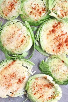 several lettuce halves with some seasoning sprinkled on them