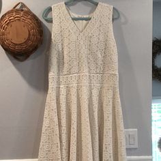 Gorgeous Ivory Lace/Crochet Fully Lined Fit And Flare Dress With Back Zip Cream Sleeveless Lace Crochet Dress, Beige Lace Crochet Dress With V-neck, Off White Sleeveless Lace Midi Dress, Black Flare Dress, Cashmere Sweater Dress, Pom Pom Dress, Club Dress, Blue And White Dress, Midi Sheath Dress