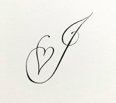 the letter f is made up of black ink and has a small heart on it