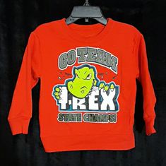 Pullover Sweatshirt Deep Orange W/Olive Green Letters/Bold Green Dinosaur Nwot .... Fop Ready To Ship Cotton Tops With Dinosaur Print For Fall, Cotton Top With Dinosaur Print For Fall, Casual Dinosaur Print Tops For Fall, Long Sleeve Top With Dinosaur Print For Fall, Pre-shrunk Orange Long Sleeve Tops, Winter Dinosaur Print Crew Neck Top, Orange Pre-shrunk Long Sleeve T-shirt, Green Letters, Green Dinosaur