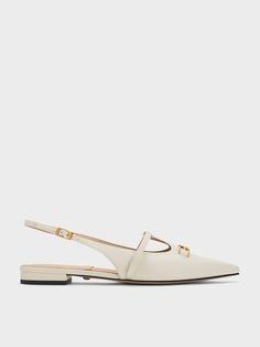 Wherever you go, exude polish and sophistication with these T-bar slingback flats. A part of our Gabine family range, they feature the iconic U-shaped buckles interlocked at the front, adding a touch of glamour to these elegant white shoes. Equal parts stylish and practical, these flats come with adjustable slingback straps for a customised fit, ensuring ease of wear. Crafted from genuine leather, they promise both durability and comfort, softening and becoming even more comfortable with each wear. Elegant White Shoes, Slingback Flats, Size Chart For Kids, Charles Keith, Sheep Leather, Low Block Heels, White Shoes, Belt Size, Leather Heels