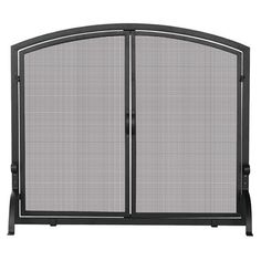 a black fireplace screen with two doors