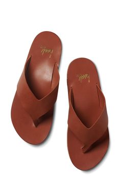 Wide straps carefully crafted from vegetable-tanned leather bring a modern look to this flip-flop set on a rubber sole with reliable traction. Arch support Leather upper and lining/leather and rubber sole Imported Classic Leather Sandals For Everyday, Leather Sandals With Leather Lining For Everyday, Brown Open Toe Flip Flops For Everyday, Everyday Brown Open Toe Flip Flops, Brown Flip Flops With Removable Insole For Everyday, Brown Toe Post Sandals For Everyday, Classic Leather Flip Flops For Beach, Classic Everyday Flip Flops With Single Toe Strap, Classic Leather Flip Flops For The Beach