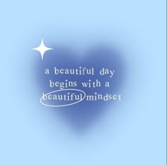 a beautiful day begins with a beautiful mindset written in white on a blue background