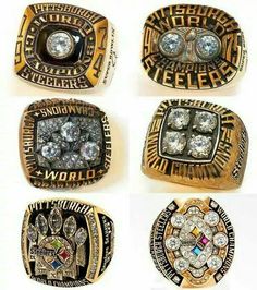 four rings with different designs on them