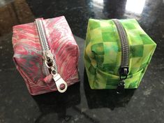 "This little zippered bag can be used as an eco-friendly mini jewelry case, cosmetic case or to store a pacifier on travel as this fully-lined cube pod has no untidy-seams to entangle with the little things you place inside.    This is a very creative way to use fabric left over from other projects. Make some of them during your free time and use them as gifts for baby showers, birthdays or Christmas.     We provide the ACTUAL SIZE (a cube of 2 ½ inch each side) pattern on a PDF! All you need is to cut out the fabric using the pattern we provided and follow the instructions in the tutorial to stitch it. Our tutorial includes many actual photographs to explain the sewing steps. You are minutes away from having your own creation! You can easily print this pattern on a letter size paper (8.5\ Green Portable Pencil Case For Gift, Green Rectangular Pencil Case For Gift, Green Zipper Coin Purse For Travel, Green Travel Coin Purse With Zipper, Rectangular Pencil Case With Zipper Closure As Gift, Compact Bag With Zipper Pocket For Gift, Rectangular Zipper Pouch For Gifts, Rectangular Zipper Pouch As Gift, Rectangular Pouch With Zipper Closure For Gifts