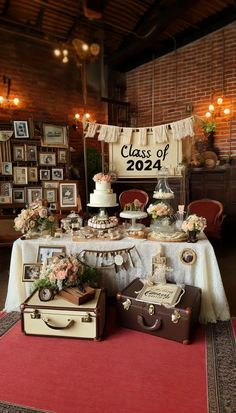 a table topped with lots of cake and suitcases