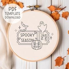 a cross stitch pattern with the words spooky season and a ghost on it