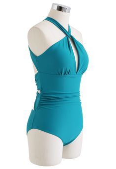 Radiate your sultry temperate in this cutout open back swimsuit, we bet you'll be the beachside's beautiful scenery to others. It features the solid color, cutout at the upper waist, and an almost full open-back design that is just mesmerizing as you are!    - Halter neck  - Cut-out design  - Removable padded cups  - Open back  - Ruched sides  - Hook fastening at neck  - Not lined  - 82% Polyamide, 18% Elasthane  - Wash at 30° C with like color only            Size  Length  Bust  Waist      S  cm  61  84  60-72      inch  24  33  23.5-28      M  cm  62  88  64-76      inch  24.5  34.5  25-30      L  cm  63  92  68-80      inch  24.5  36  26.5-31.5 Solid Color Backless Tankini For Beach Party, Solid Backless Tankini For Beach Party, Turquoise Halter Neck Swimwear For Poolside, Solid Cutout Swimwear For Summer, Sleeveless Cutout Swimwear For Beach Party, Turquoise One-piece Summer Swimwear, Turquoise One-piece Swimwear For Summer, Turquoise Halter Neck Swimwear For Summer, Cutout Swimwear For Beach Party Season