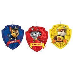 three different shaped toys hanging from strings on a white background, each with a dog and fireman's name