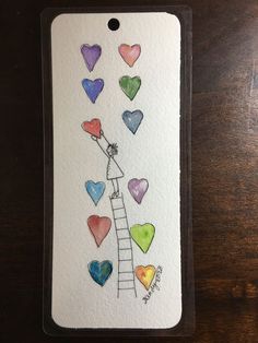 a card with hearts and a ladder on it