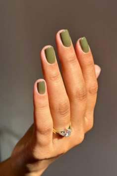 Follow the link for more green nail inspiration for 2024. Green Nail Colours, Short Biab Nails Green, Earth Tone Manicure, Olive Nail Color, Short Olive Green Nails, Nails 2024 Green, Green Nail Colors, Green Oval Nails, Green Manicure