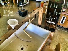 an unfinished sink being worked on in a kitchen