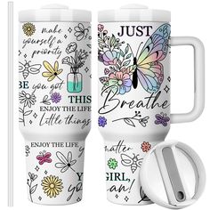 two white travel mugs with different designs on them