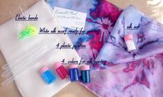 the contents of a tie dye kit laid out on a table with instructions for how to use them