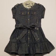 Adorable Button Down Denim Blue Dress With Pockets And Belt. Brand New With Tags. Cute Blue Dress With Button Closure, Cute Blue Dresses With Button Closure, Casual Cotton Dresses By Ralph Lauren, Casual Cotton Ralph Lauren Dresses, Blue Cotton Denim Dress With Snap Buttons, Denim Blue Cotton Dresses With Snap Buttons, Denim Blue Cotton Dress With Snap Buttons, Cute Denim Dress With Pockets, Fitted Denim Blue Cute Denim Dress