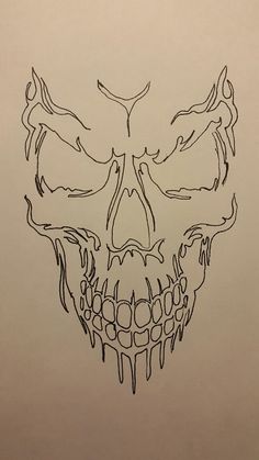 a drawing of a skull with lots of teeth