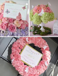 pink and green flowers are arranged around a wreath with cards on it, and butterflies