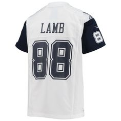 When CeeDee Lamb is on the field, opposing teams take notice, so help your youngster showcase their admiration of one of the top players in the NFL with this exclusive Dallas Cowboys Game jersey from Nike. Complete with mesh panels for extra breathability, this jersey replicates the authentic one that CeeDee Lamb wears every Sunday, giving your young fan the perfect piece of gear for every Dallas Cowboys game this season.When CeeDee Lamb is on the field, opposing teams take notice, so help your Nike Tops In Football Team Colors For Football Season, Nike Tops For Football Season In Team Colors, Nike Tops For Football Season Sports Events, Nike Tops For Football Season, Nike Team Spirit Jersey With Team Logo, Football Season Fan Apparel Jersey With Short Sleeves, Throwback Tops For Team Events During Sports Season, Nike Football Season Jersey With Team Name, Nike Jersey With Team Name For Football Season