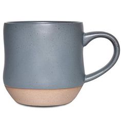 a gray and tan coffee cup with two toned sides on a white background, the mug is made out of ceramic