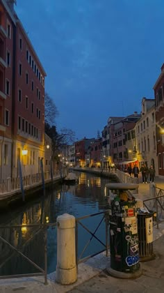 a canal that is next to some buildings