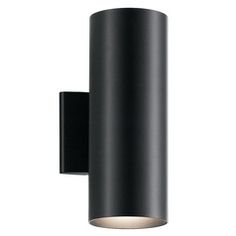 an outdoor wall light that is black and has a white light on the side of it