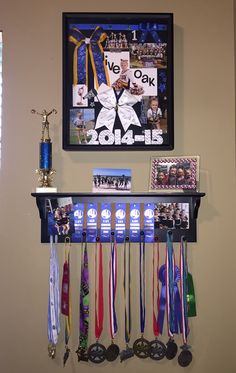 a wall with medals hanging from it's sides