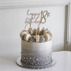 a birthday cake with frosting and decorations on top