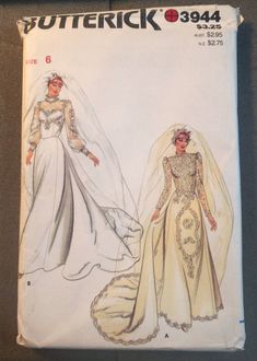 two brides in wedding gowns and veil on the cover of a sewing pattern