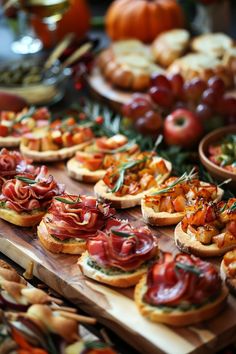 many different types of appetizers on wooden trays