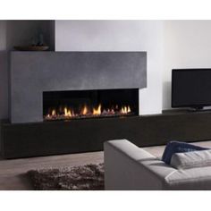 a modern fireplace is shown in this living room