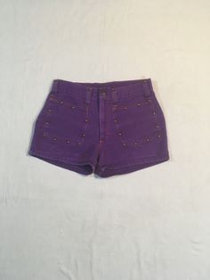 "1960s purple denim jean shorts label- h.i.s. for her, 'don't envy h.i.s... wear them' cotton feel burnished metal rivet studs detail TALON metal zipper snap top 2 front pockets5 belt loops back waist darts good vintage condition, small pocket seam repair, light wear, as photos show no size tag see below measures, lying flat, waist-14\" rise-10\" inseam-2 1/4\" hem-10\" outseam-11" Y2k Fitted Jean Shorts With Pockets, Trendy Fitted High Waist Jean Shorts, Trendy Fitted High-waist Jean Shorts, Y2k Fitted Shorts For Spring, Fitted Y2k Shorts For Spring, Fitted Y2k Style Shorts For Spring, Fitted Y2k Jean Shorts, Y2k Fitted Jean Shorts, Y2k High Rise Fitted Shorts