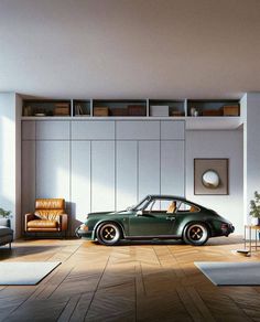 a green car is parked in the middle of a room with white walls and wooden floors