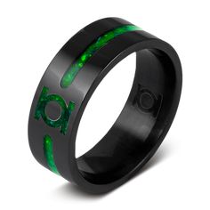 black and green wedding ring with the word love on it's center, surrounded by circles