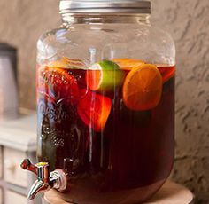 a jar filled with liquid sitting on top of a table