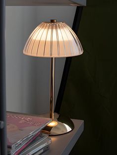 a lamp is sitting on top of a table