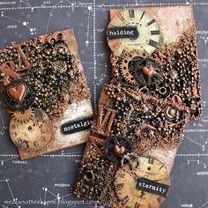 two pieces of art made out of old clocks and beads on a table with space in the background