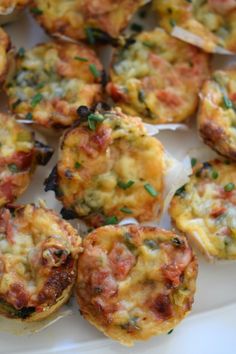 small muffins with cheese and vegetables on a white plate