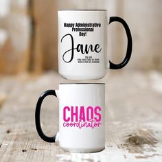 two coffee mugs sitting side by side on a wooden table with the words happy anniversary, professional and june printed on them