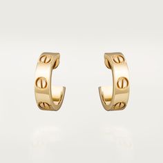 Luxury Pierced Yellow Gold Huggie Earrings, Luxury Yellow Gold Pierced Huggie Earrings, Luxury Hallmarked 14k Gold Huggie Earrings, Cartier Yellow Gold Formal Earrings, Luxury Cartier Yellow Gold Earrings, Luxury Pierced Yellow Gold Hoop Earrings, Luxury Pierced Huggie Earrings Gift, Luxury Hallmarked White Gold Huggie Earrings, Luxury Yellow Gold Pierced Hoop Earrings