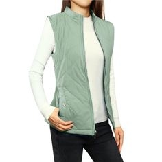 Stay cozy in this padded gilet vest outfitted with a stand collar, slanted front pockets with toggle closures, and utility-chic zipper for a customized fit.It's the perfect layering choice to pair with a long-sleeve top or even a high neck sweater.It is perfect for fall, wear yours for a cute look when out for fun.Team with plaids shirt and jeans for a simple yet stylish finish. Size: medium. Color: dusty green. Gender: female. Age Group: adult. Pattern: Solid. Material: Polyester. Womens Tailored Suit, Zipper Vest, Padded Vest, Womens Puffer Vest, Dusty Green, High Neck Sweater, Outerwear Vest, Vest Fashion, Woman Standing